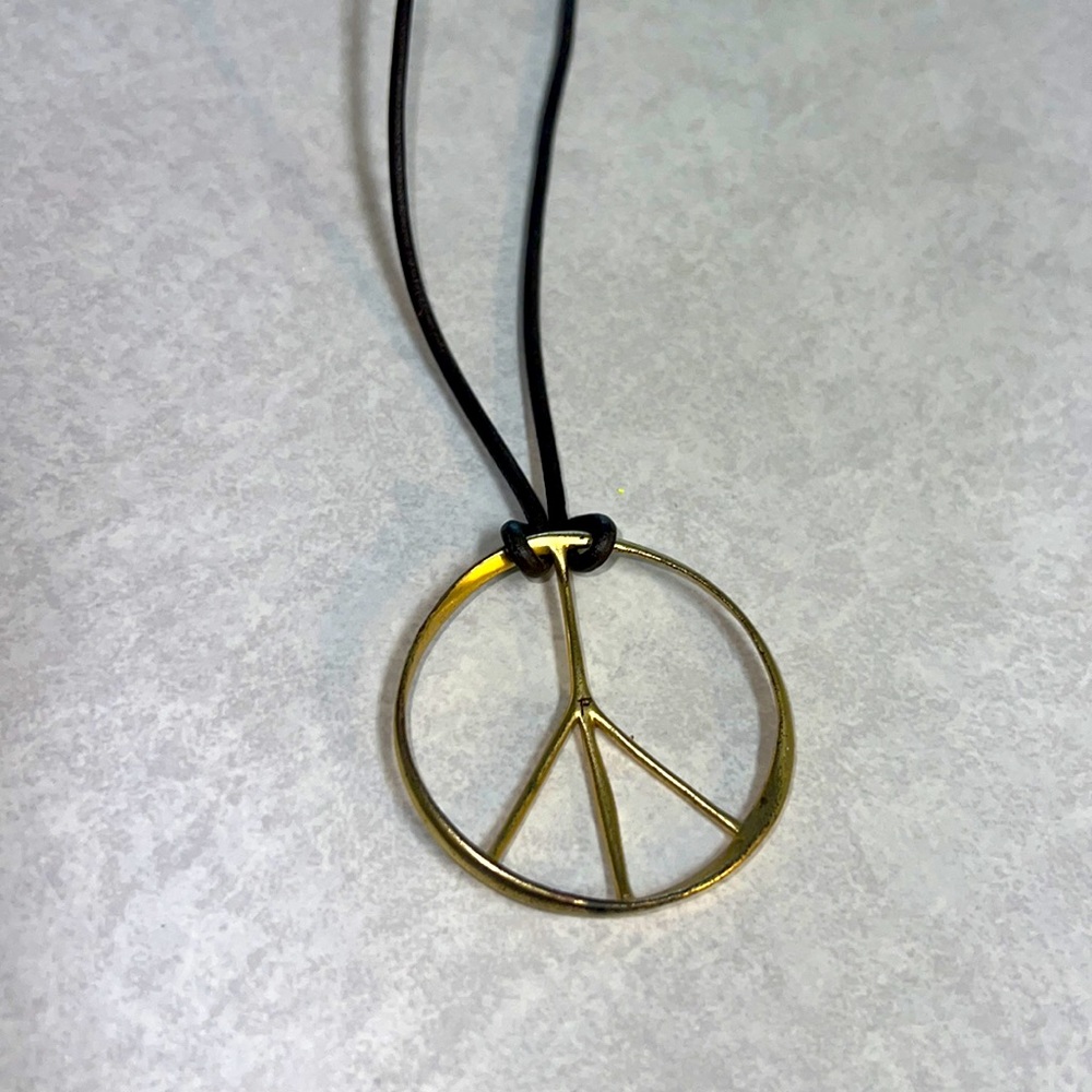 Fossil peace necklace